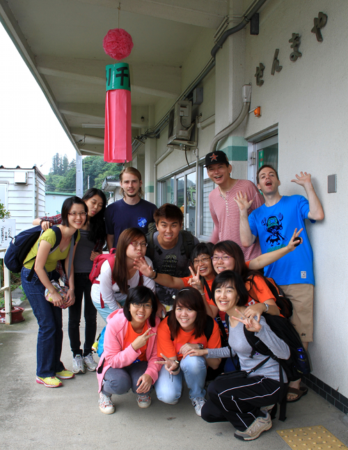 Team with CRASH Japan volunteers at Senmaya train Station