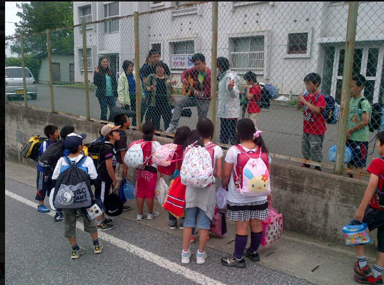 Impromptu singing session by June team with the kids from a school in Ichinoseki