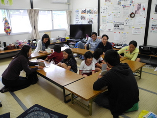 Micah conducting the English class 